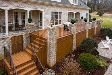 Deck - large transitional backyard deck idea in Other with a fire pit and no cover