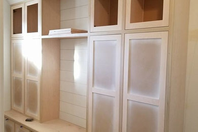 Custom mudroom built in w/ wire mesh inserts