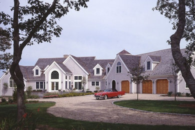 Inspiration for a gray two-story gable roof remodel in Boston