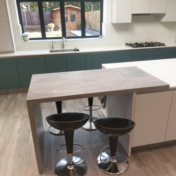 Sleek Kitchen Design in Headstone By  Kudos Interior Designs