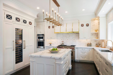 Large transitional u-shaped dark wood floor enclosed kitchen photo in San Francisco with an undermount sink, shaker cabinets, white cabinets, white backsplash, mosaic tile backsplash, paneled appliances, an island and white countertops