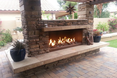 Inspiration for a large modern backyard patio remodel in Phoenix