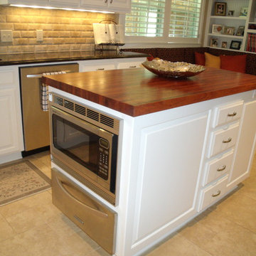 Texas Mesquite Work Island Compliments this Traditional Kitchen