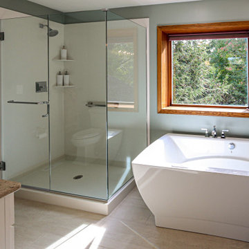 White Master Bathroom with Freestand Tub and Corian Solid Surface Shower
