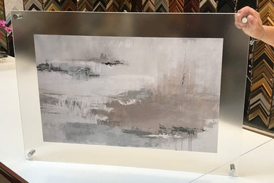 artwork between acrylic glass
