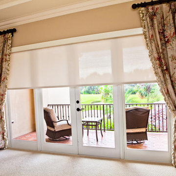 Motorized Sun Shades and Drapery Panels in Master Bedroom