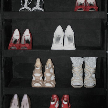 These black velvet shelves move and rotate up and down.