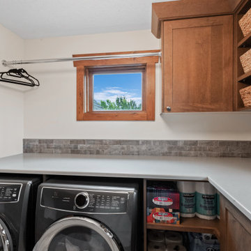 Laundry relocated from main floor mudroom to upper floor