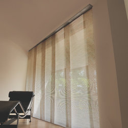 Larger windows and patio doors can benefit from the updated look of Levolor pane - Vertical Blinds