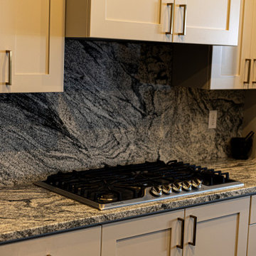 Granite Kitchen Countertops- Waterfall Edges & Full Height Backsplash