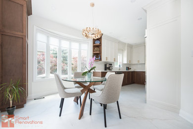 Transitional dining room photo in Toronto