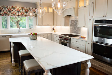 Inspiration for a traditional kitchen in DC Metro with quartz benchtops.