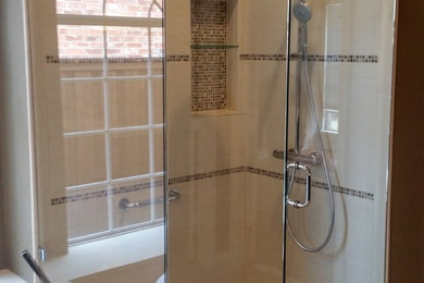 Mid-sized master beige tile and ceramic tile cement tile floor and beige floor bathroom photo in Dallas with brown walls, quartzite countertops and a hinged shower door
