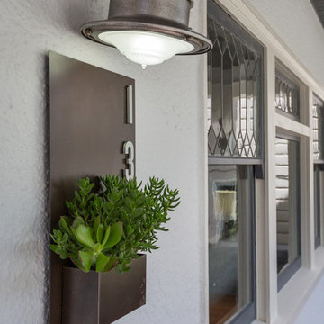 Hamptons-inspired casual/chic restoration of a grand Glenview Craftsman