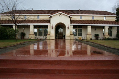 Mountain style beige one-story stucco exterior home photo in San Luis Obispo