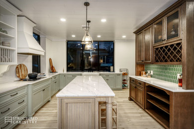 Enclosed kitchen - large transitional u-shaped enclosed kitchen idea in New York with a farmhouse sink, beaded inset cabinets, light wood cabinets, quartz countertops, an island and white countertops