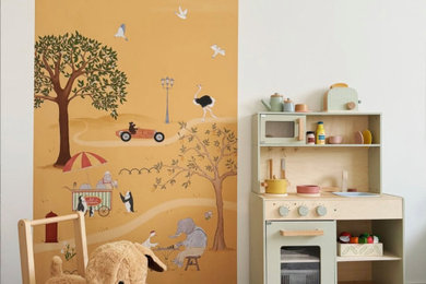 Small contemporary gender neutral kids' bedroom in Sussex with yellow walls, carpet, blue floors and a feature wall.
