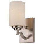 Trans Globe Lighting - Mod Pod 4.5" Wall Sconce - The Mod Pod Collection exhibits a unique wall sconce that is perfect for adding supplemental lighting to any interior wall space. The Modern tone allows the wall sconce to stand out as both functional and decorative as it lights up any interior setting.  This single-light fixture has a rectangular back plate and can be mounted upwards or downwards.  The Mod Pod Collection is Modern style indoor lighting, with a transitional urban influence.  A White Frost heavy candle shade and steam-punk piston hardware give the Mod Pod 4.5" Wall Sconce a recycled appeal and an industrial attitude. Two finish options are available to choose from in this collection, making it easy to blend with warm or cool color interiors.