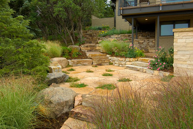 Inspiration for a rustic landscaping in Denver.