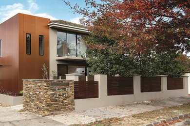 Photo of a large contemporary duplex exterior in Sydney.