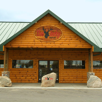 Exterior walls and porch with smooth quarter log siding
