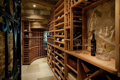 Example of a tuscan wine cellar design in Phoenix