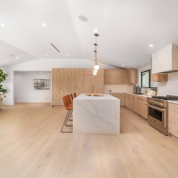 Light Oak Kitchen with Marble Waterfall Island