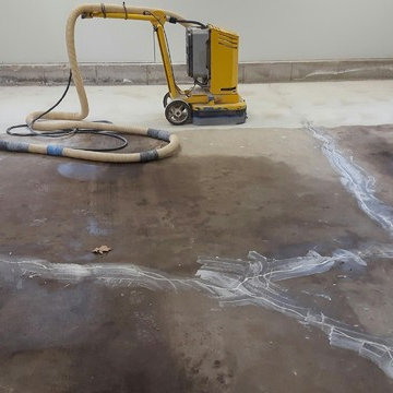 Oil, Cracks, Uneven Floor, Cold Weather, Unhappy Client