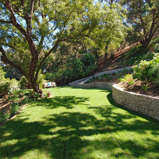 Photo of a french country backyard landscaping in Los Angeles.
