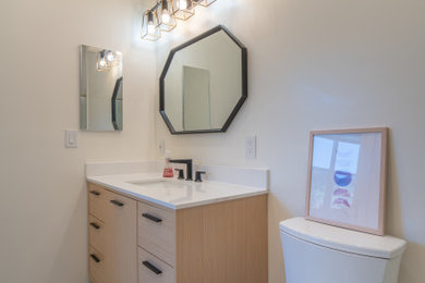 Example of a small minimalist master white tile and ceramic tile single-sink, ceramic tile and gray floor bathroom design in San Francisco with flat-panel cabinets, brown cabinets, quartz countertops, white countertops, a freestanding vanity and white walls