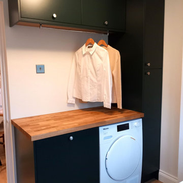 Green and oak utility room