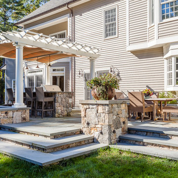 Backyard patio by Oakwoods Landscape