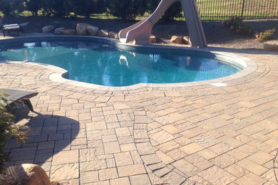 landscaping and paver patio around pool in knoxville tn