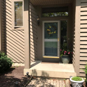 Oswego Home Receives Stone Wainscoting and New Siding
