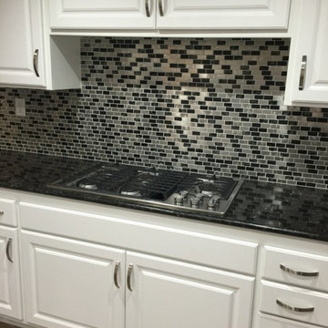 Eden Mosaic Tile Installations: Stainless Steel And Crackled Glass Mix Tile
