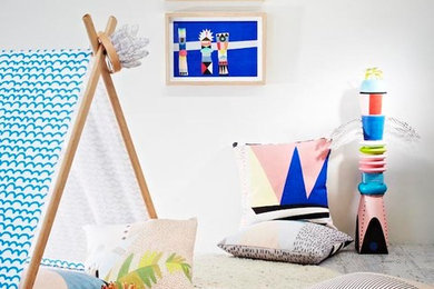Modern gender-neutral kids' playroom in Sydney with white walls for kids 4-10 years old.