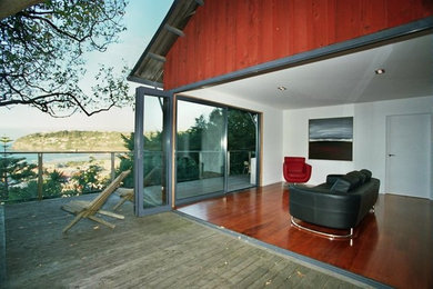 Balcony - large coastal balcony idea in Christchurch