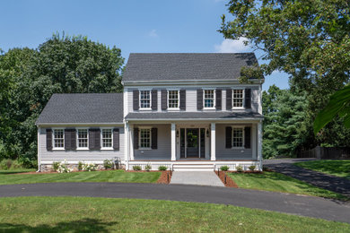 Large traditional gray two-story wood and clapboard exterior home idea in Boston