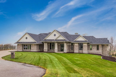 Example of an exterior home design in Cedar Rapids