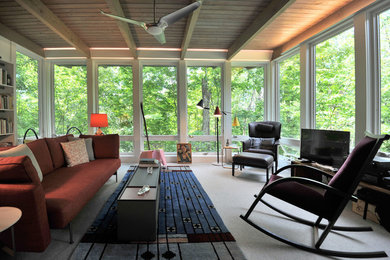 Example of a small 1950s enclosed carpeted and beige floor family room design in Indianapolis with a music area
