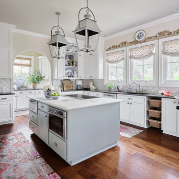 off white painted kitchen cabinets & updated wallpapered spaces