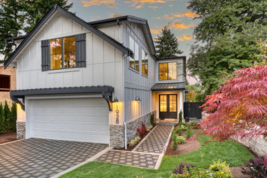 Example of a farmhouse home design design in Seattle
