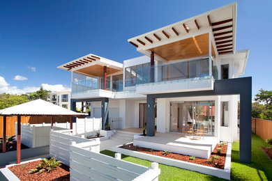 Design ideas for a large beach style home design in Sunshine Coast.
