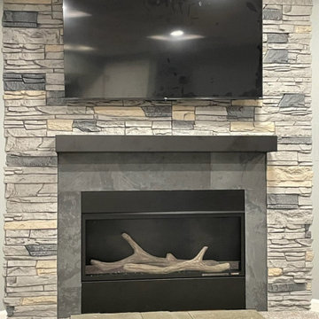 Northern Slate Stacked Stone TV and Fireplace Wall