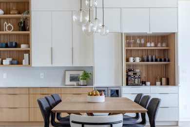 Example of a trendy dining room design in Seattle