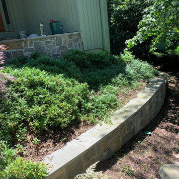 Walkway, retaining walls, plantings and stone stairs and front stoop