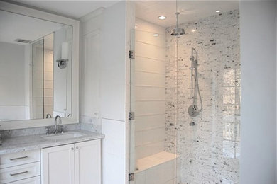 Design ideas for a transitional master bathroom in Toronto with white cabinets, marble benchtops, an open shower, grey walls, an undermount sink and marble floors.