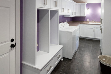 Utility room - utility room idea in Other with shaker cabinets, white cabinets, purple walls and a side-by-side washer/dryer