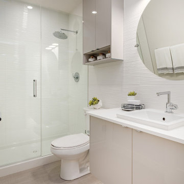 Bathroom with high Gloss Acrylic Slab cabinets in Auburn Rise home