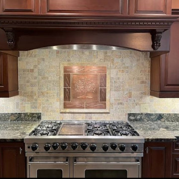 Bedford NH Travertine and copper tile backsplash
